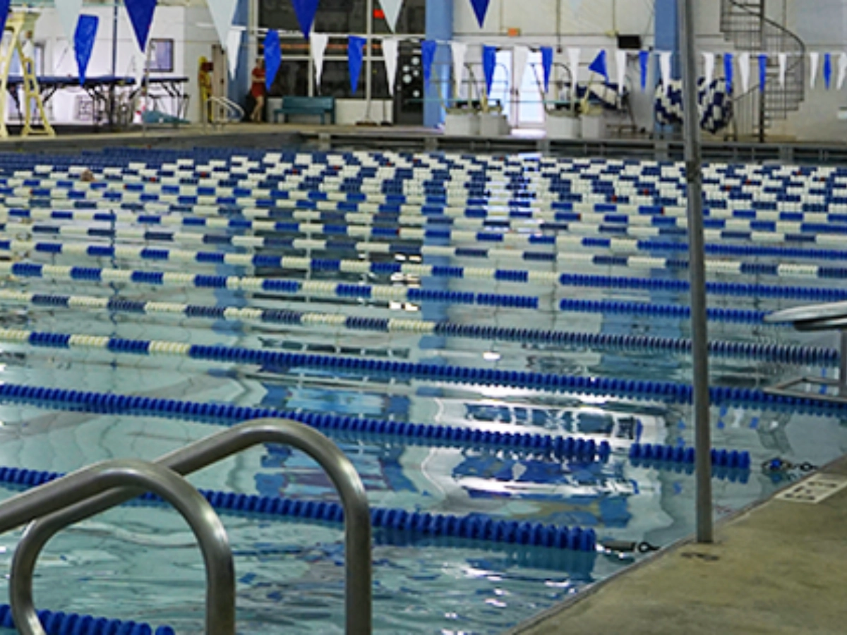 A lane pool is prepared for a swim meet.