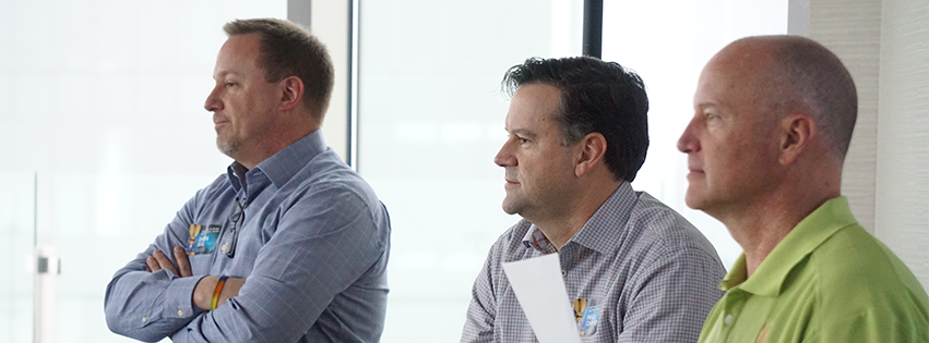 Darin, Mike, and Mark leading a meeting on the Jackrabbit Technologies company retreat.