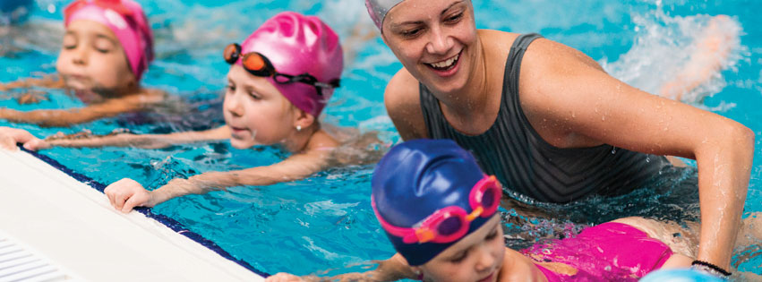 Swim coach providing one of the best swimming lessons for young children