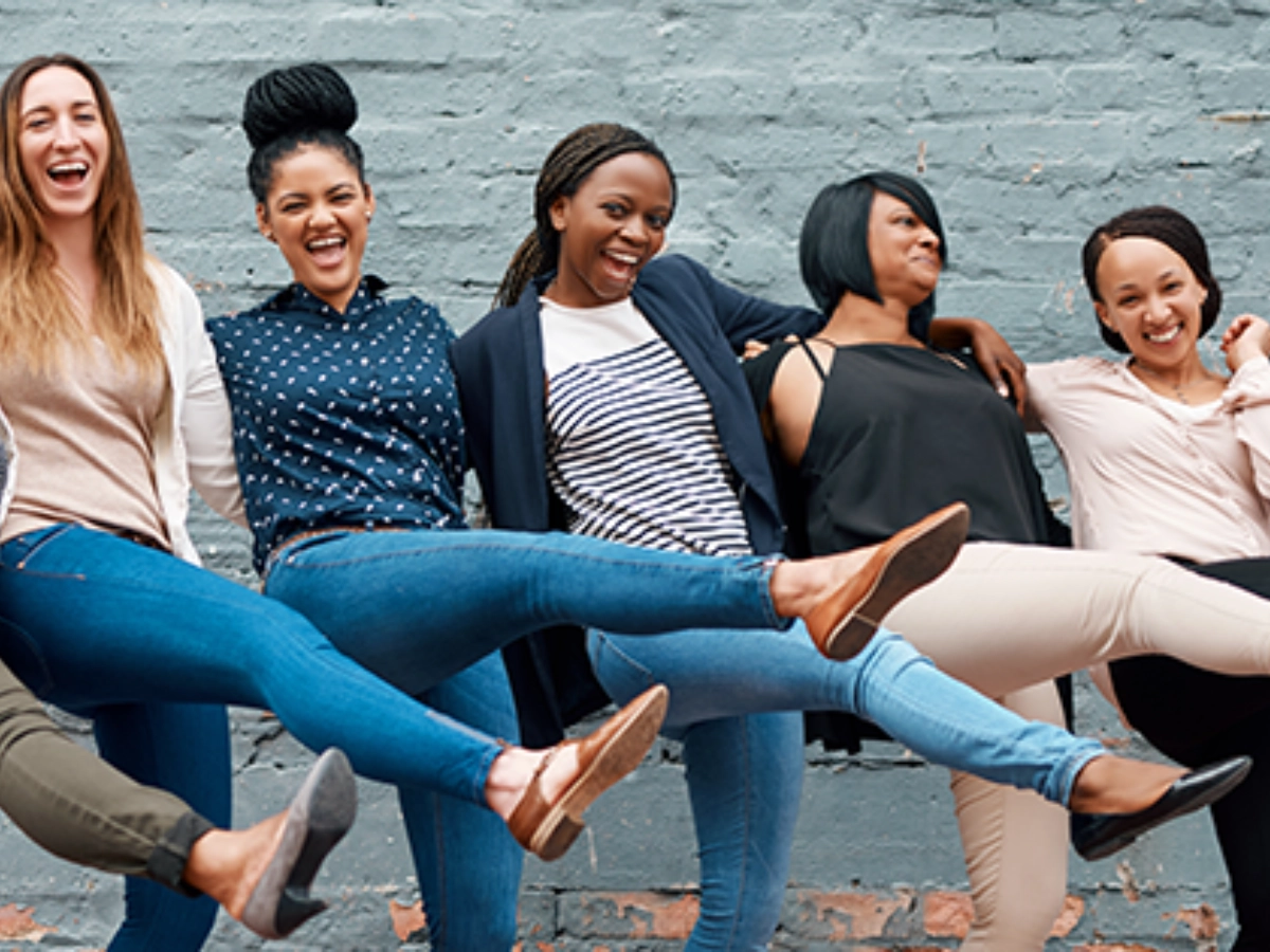 6 women doing a burlesque dance kick in unison.