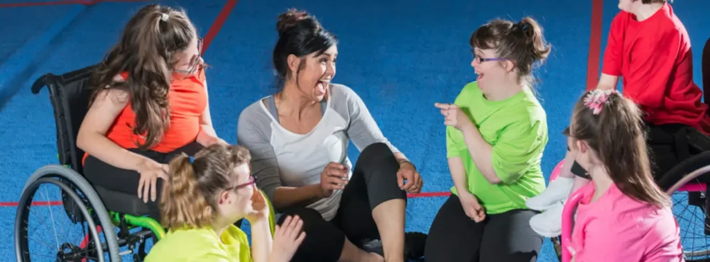 Gym teacher jokes with students