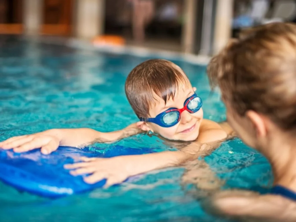 swim lesson with young boy