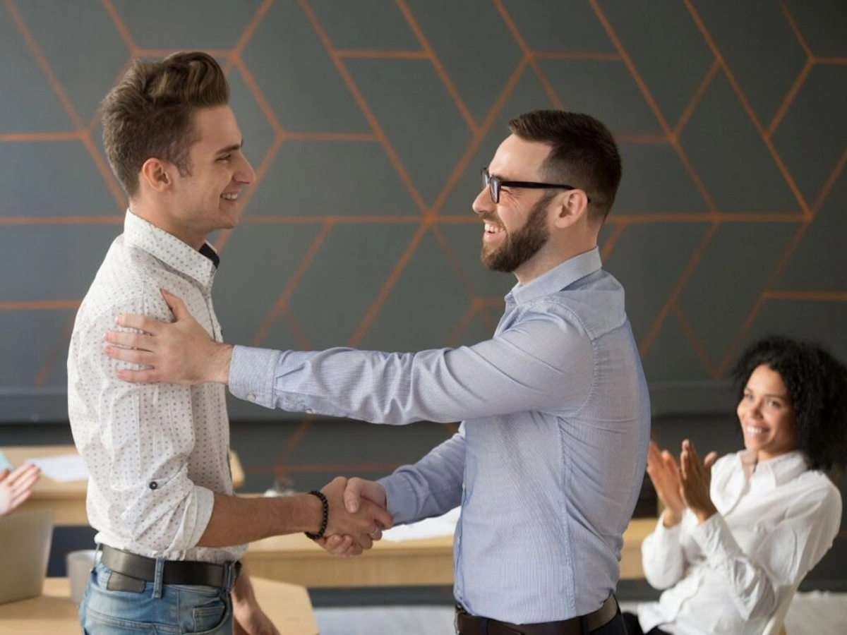 two men shaking hands