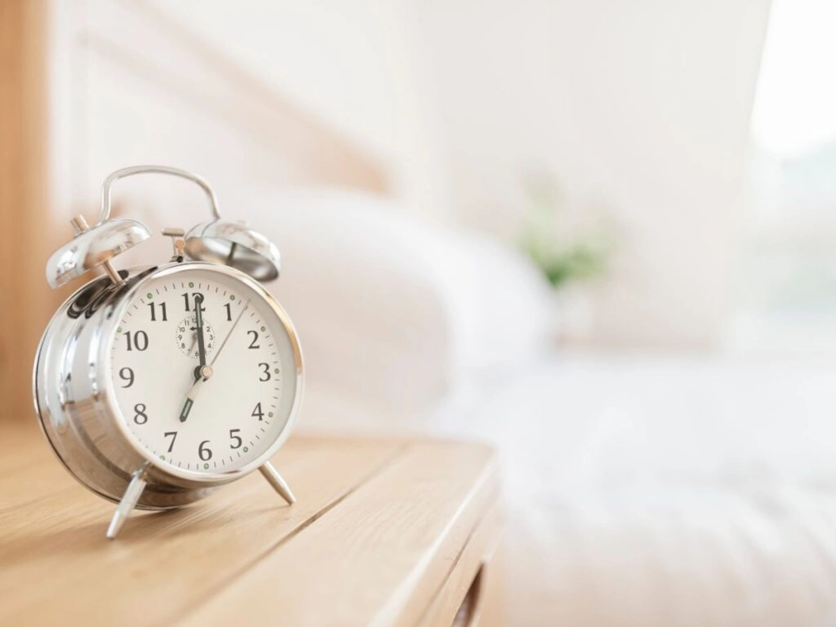 alarm clock on table