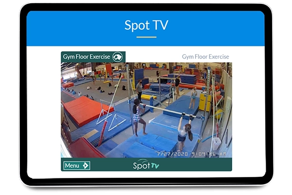 spot tv parent viewing tablet screen