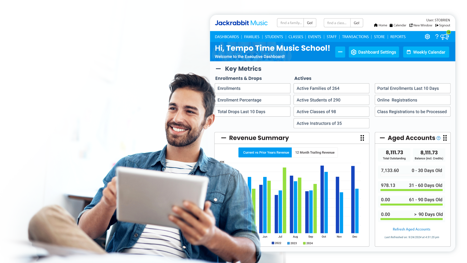 man on ipad with jackrabbit dashboard big