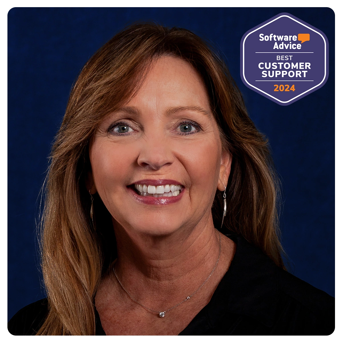 Janet headshot with best customer support 2024 badge